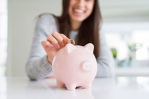 Woman and Piggy Bank