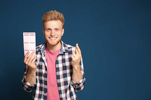 Man holding ticket